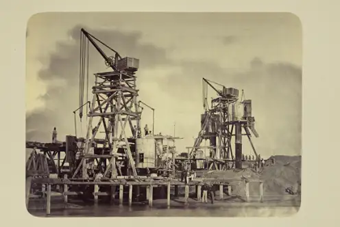 Chantier de travaux publics (Pont de Nantes appareils de fondation par air comprimé).  Jules Duclos.   Marque du Domaine Public. Collections musée de Bretagne